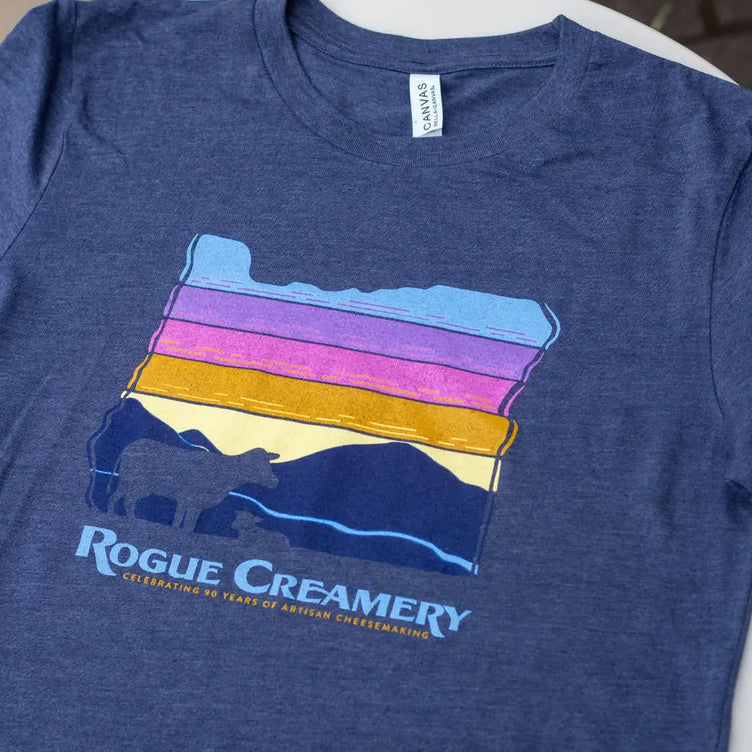 Color bars in the shape of the state of Oregon with a cow outline.
