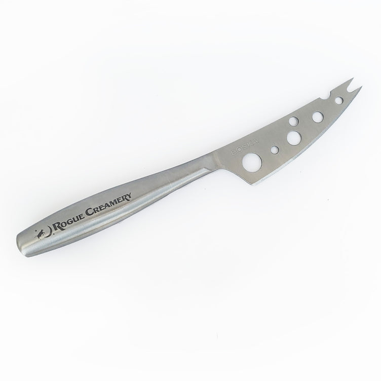 Rogue Creamery branded cheese knife on white background