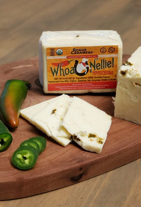 Organic Jalapeno cheese on wooden cutting board