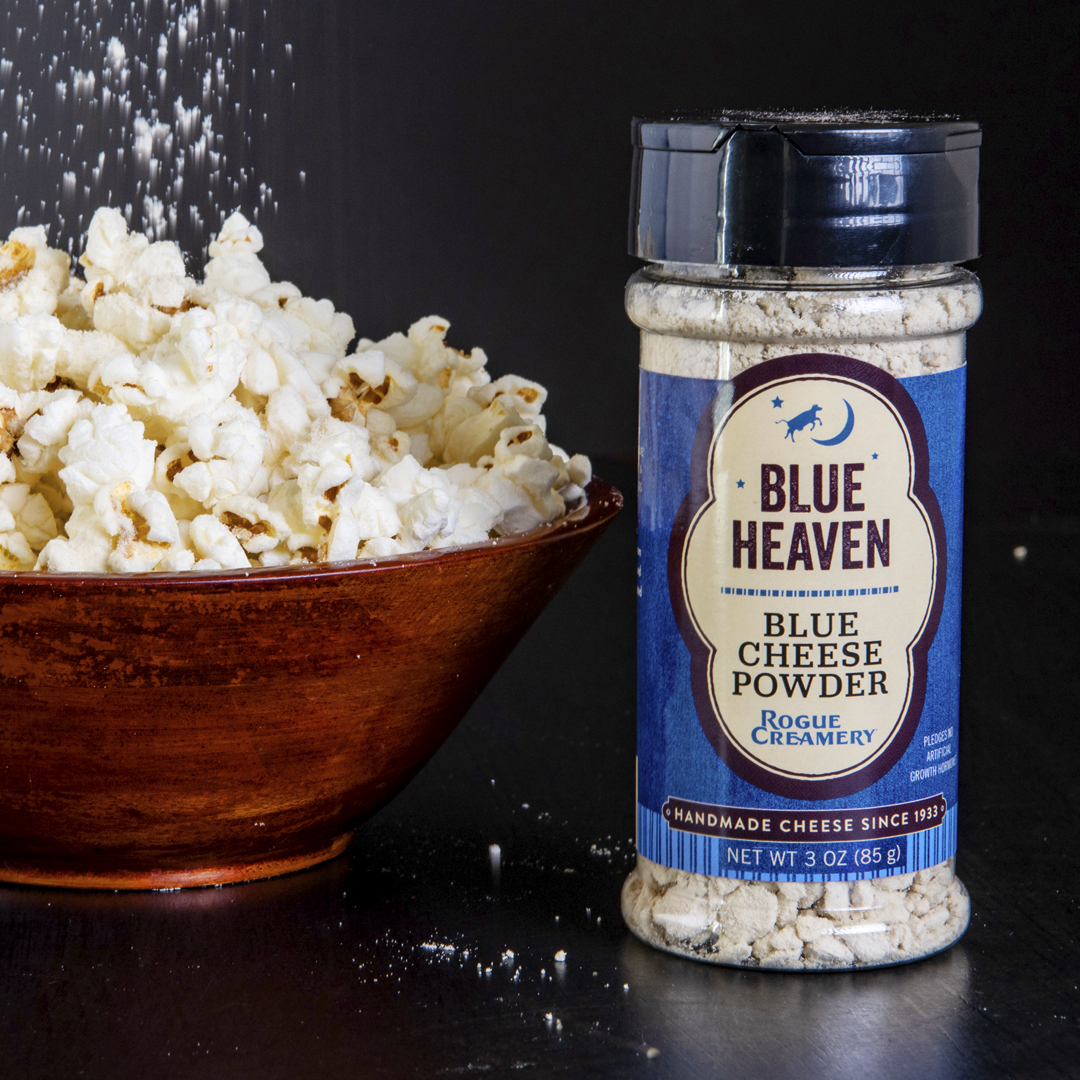 Rogue Creamery Blue Heaven Blue Cheese Powder next to a bowl of popcorn