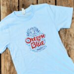 Oregon Blue Shirt on wood background