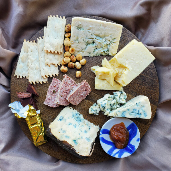 Rogue Creamery Best of the Pacific Northwest Gift Set containing chocolate, hazelnuts, blue cheese, cheddar cheese, pate, jam, and crackers